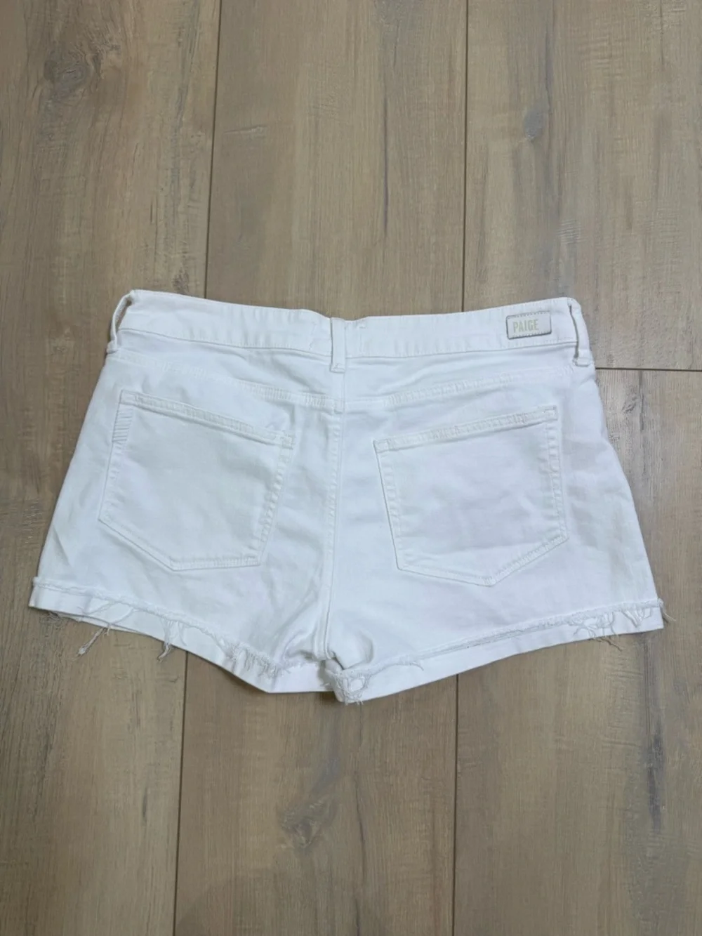 PAIGE White Denim Frayed Hem Shorts
